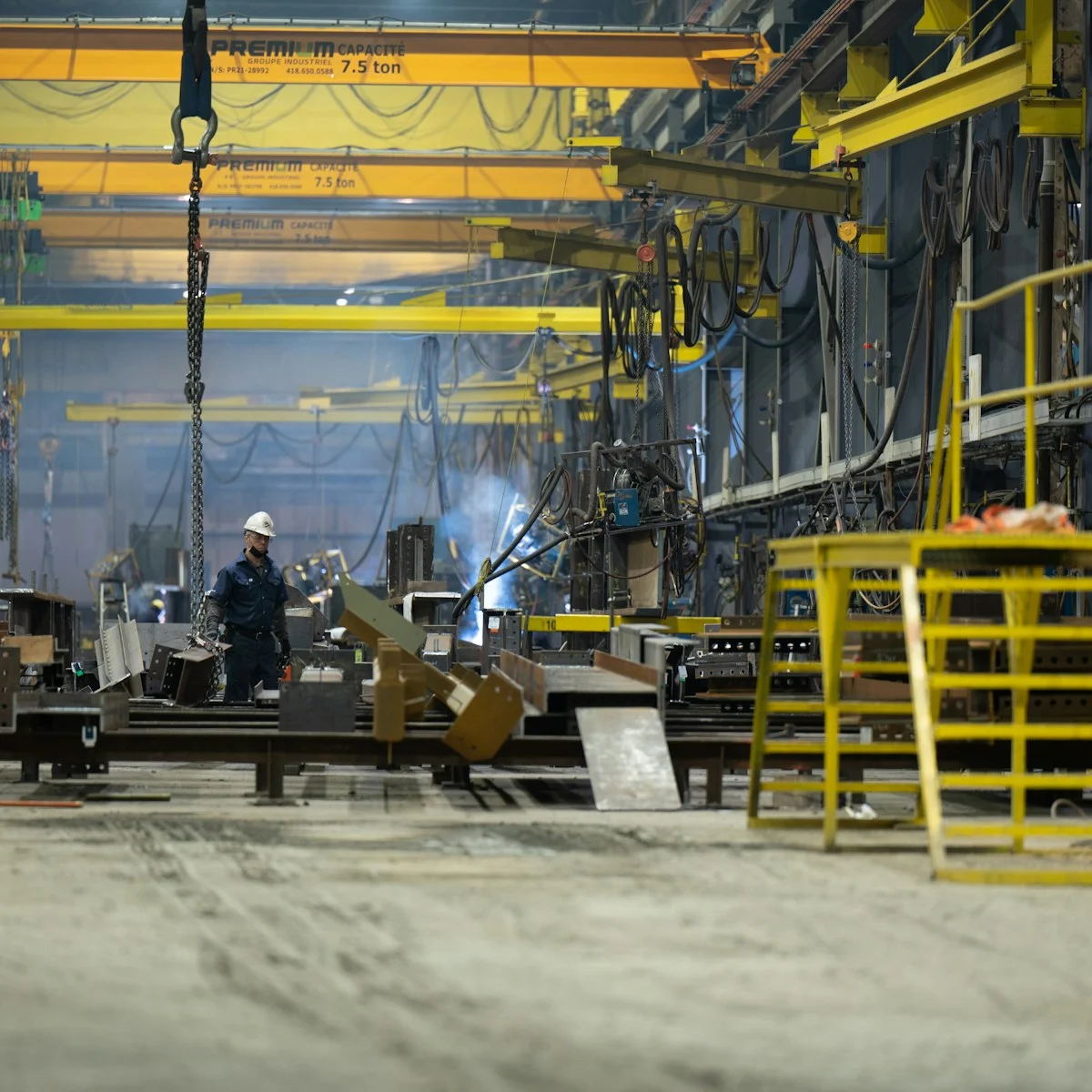 Industrial workshop floor with overhead crane